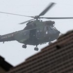 A French Army helicopter with intervention forces hovers near the scene of a hostage taking at an industrial zone in Dammartin-en-Goele, northeast of Paris