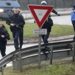 Members of the French intervention gendarme forces arrive at the scene of a hostage taking at an industrial zone in Dammartin-en-Goele, northeast of Paris